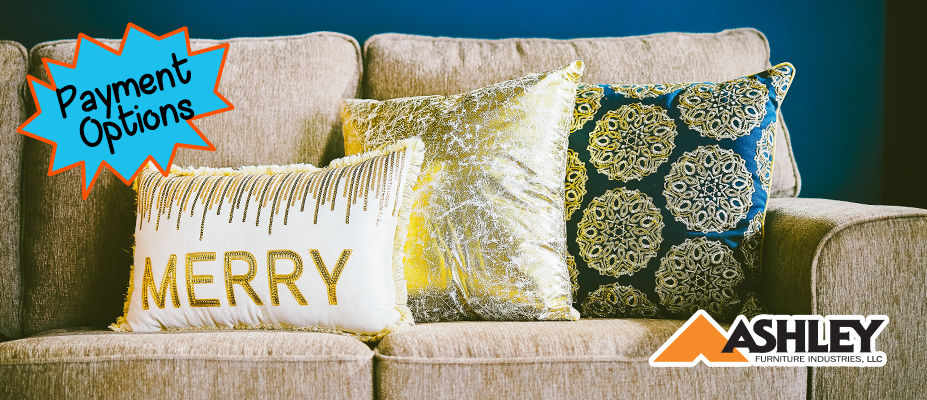 Festive pillows on an Ashley Furniture Sofa