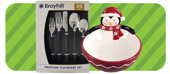 Broyhill forks, knives, and spoons next to a Festive Penguin Cookie Jar.