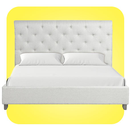 Regal-white bed frame with soft head board and gray foot board.