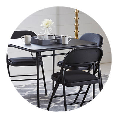 Black folding table and chairs