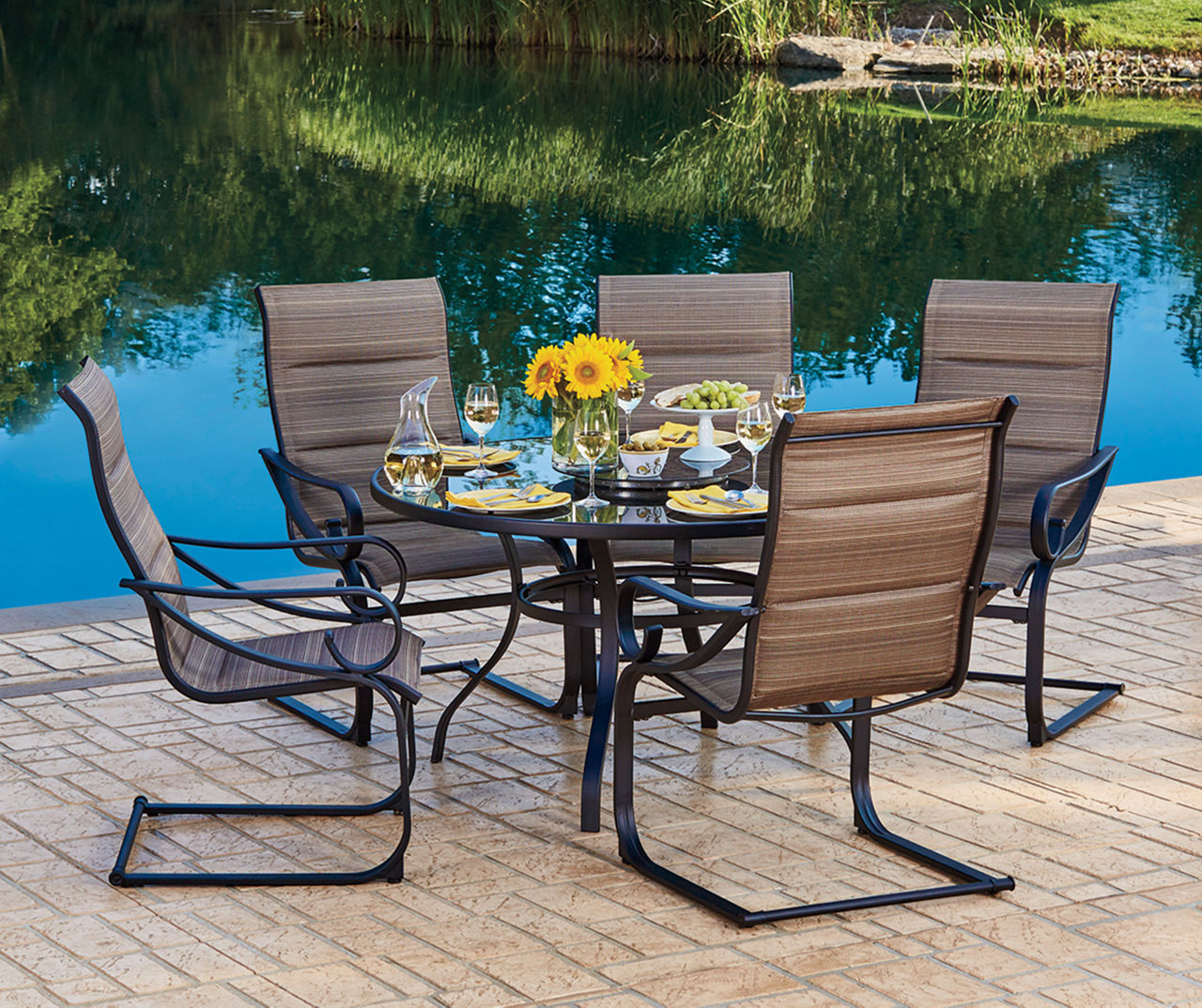 Glass top patio table set hot sale