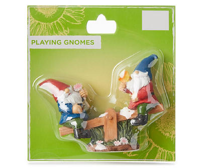 Fairy Garden Playing Gnomes on Seesaw