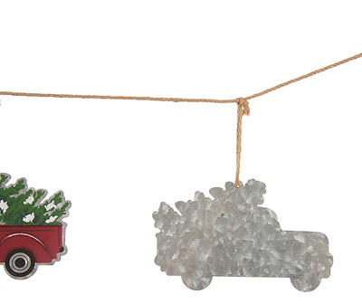 Red Metal Truck Carrying Tree Garland
