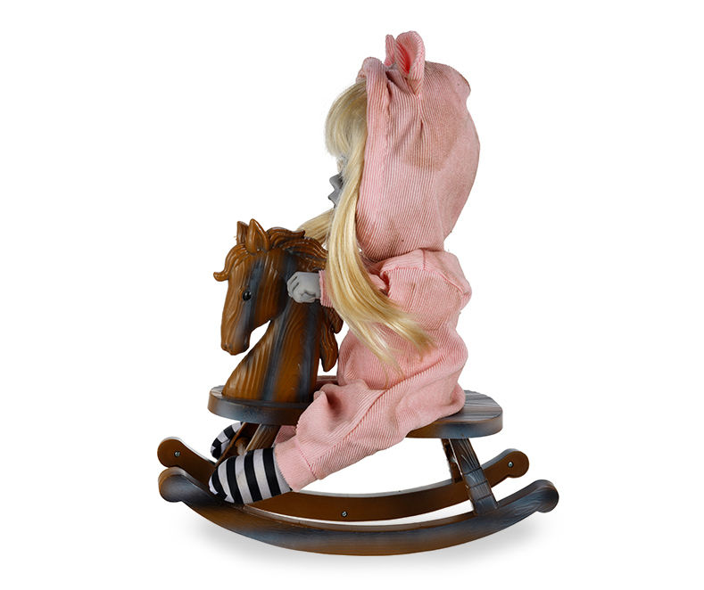 Creepy doll best sale on rocking horse