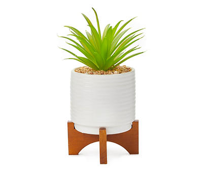 Green Artificial Plant in White Ceramic Pot With Base