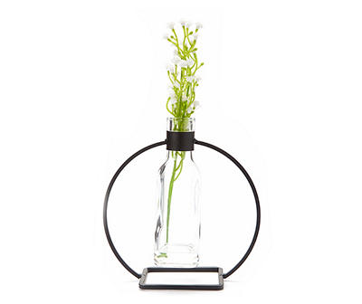 White Artificial Floral Arrangement in Glass Vase with Black Metal Rack