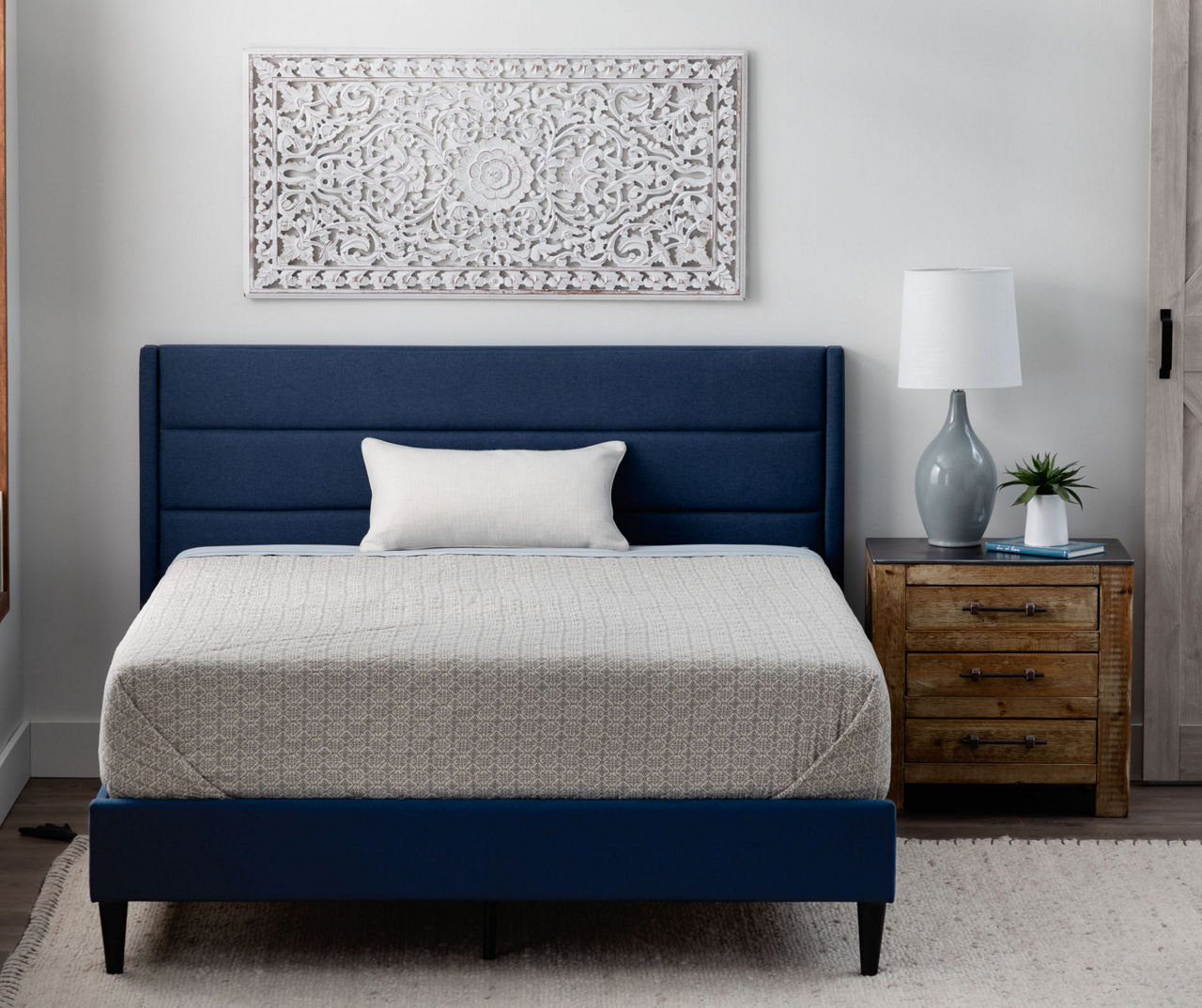 Navy upholstered king deals bed