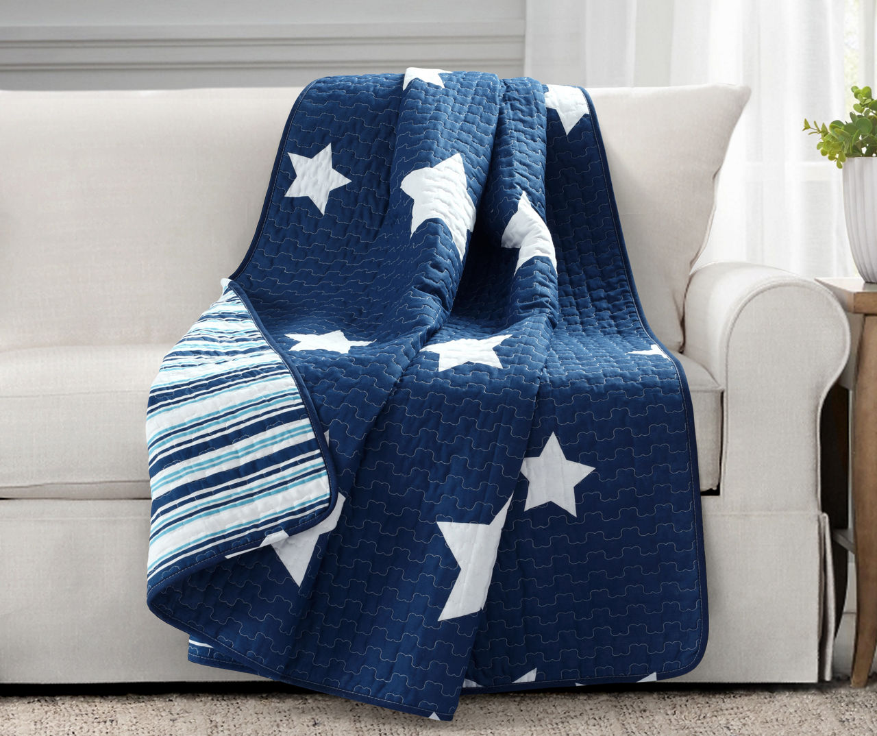 Navy quilted 2024 throw