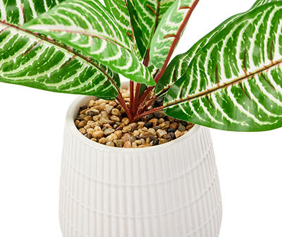 Green Artificial Leafy Arrangement With White Ridged Ceramic Pot