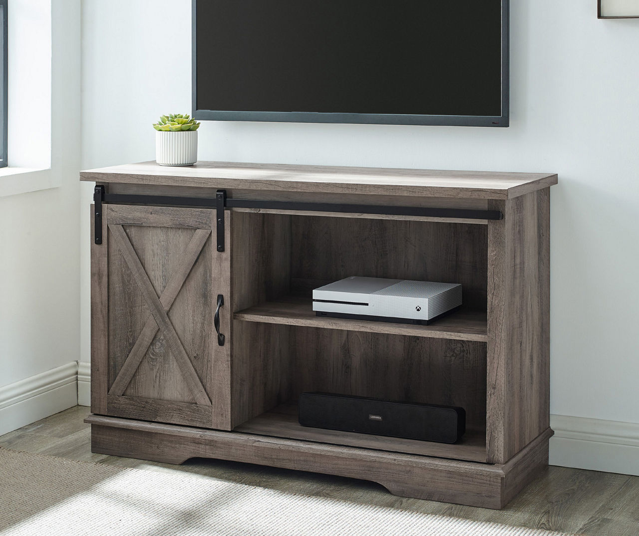 Gray sliding barn store door tv stand