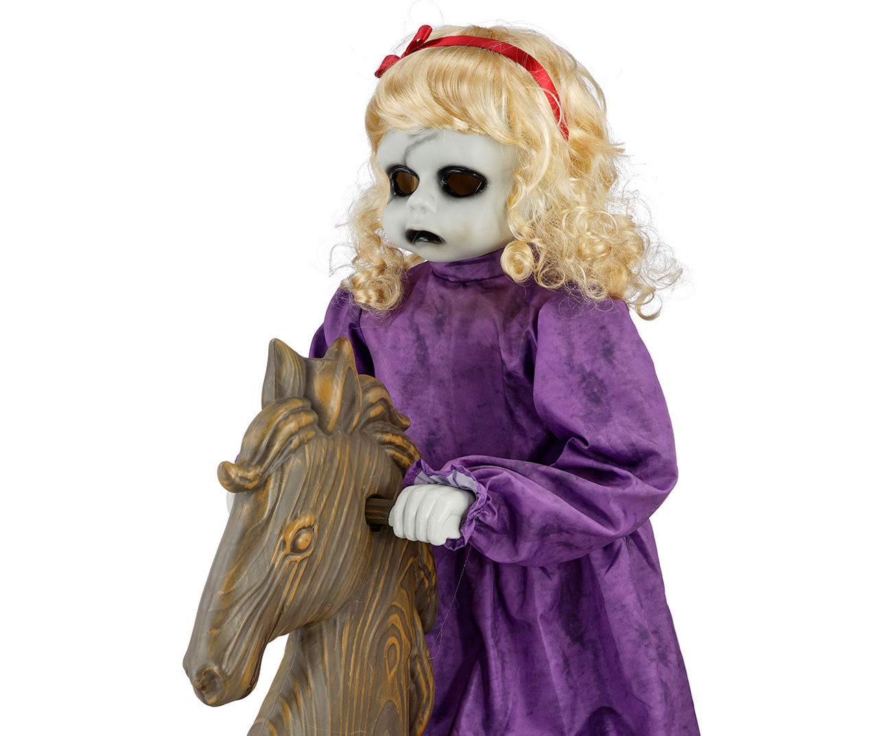 Creepy doll store on rocking horse