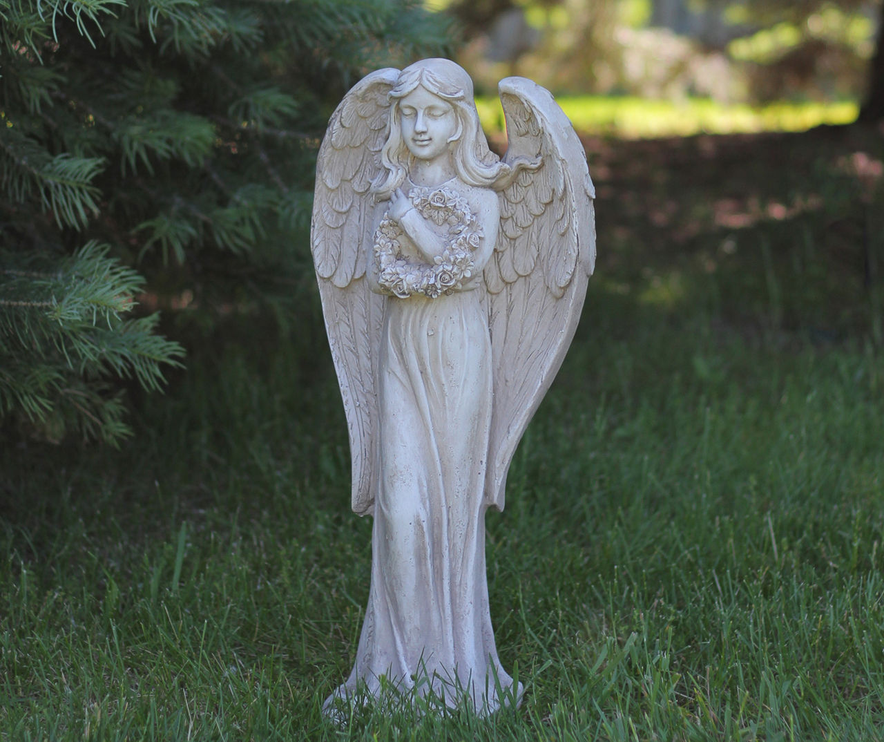 Northlight 22" Peaceful Angel Holding Wreath Statue | Big Lots