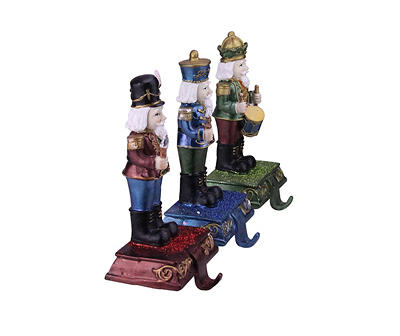 Blue, Green & Red Nutcracker 3-Piece Stocking Holder Set